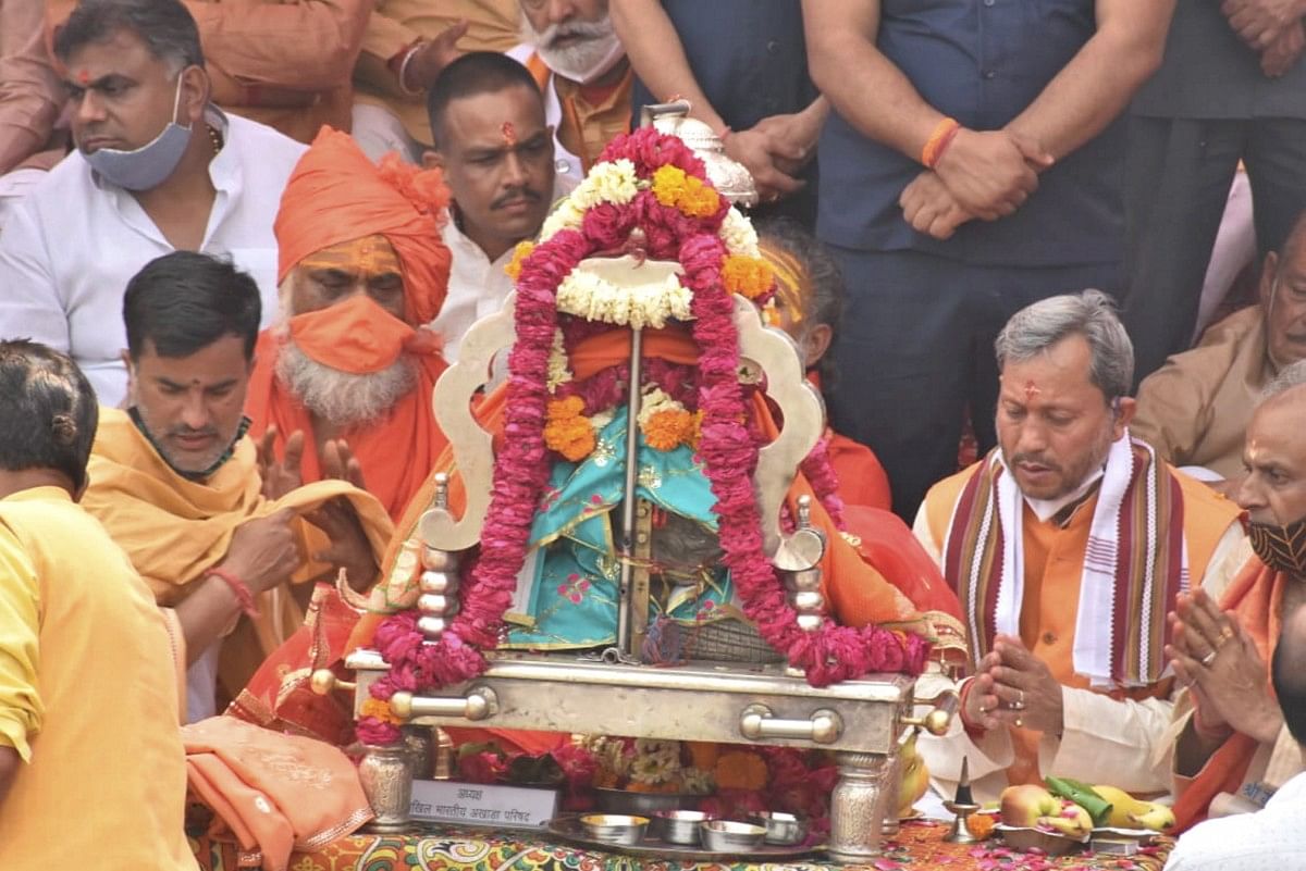 Uttarakhand CM Tirath Singh Rawat joins Kumbh celebrations without a mask