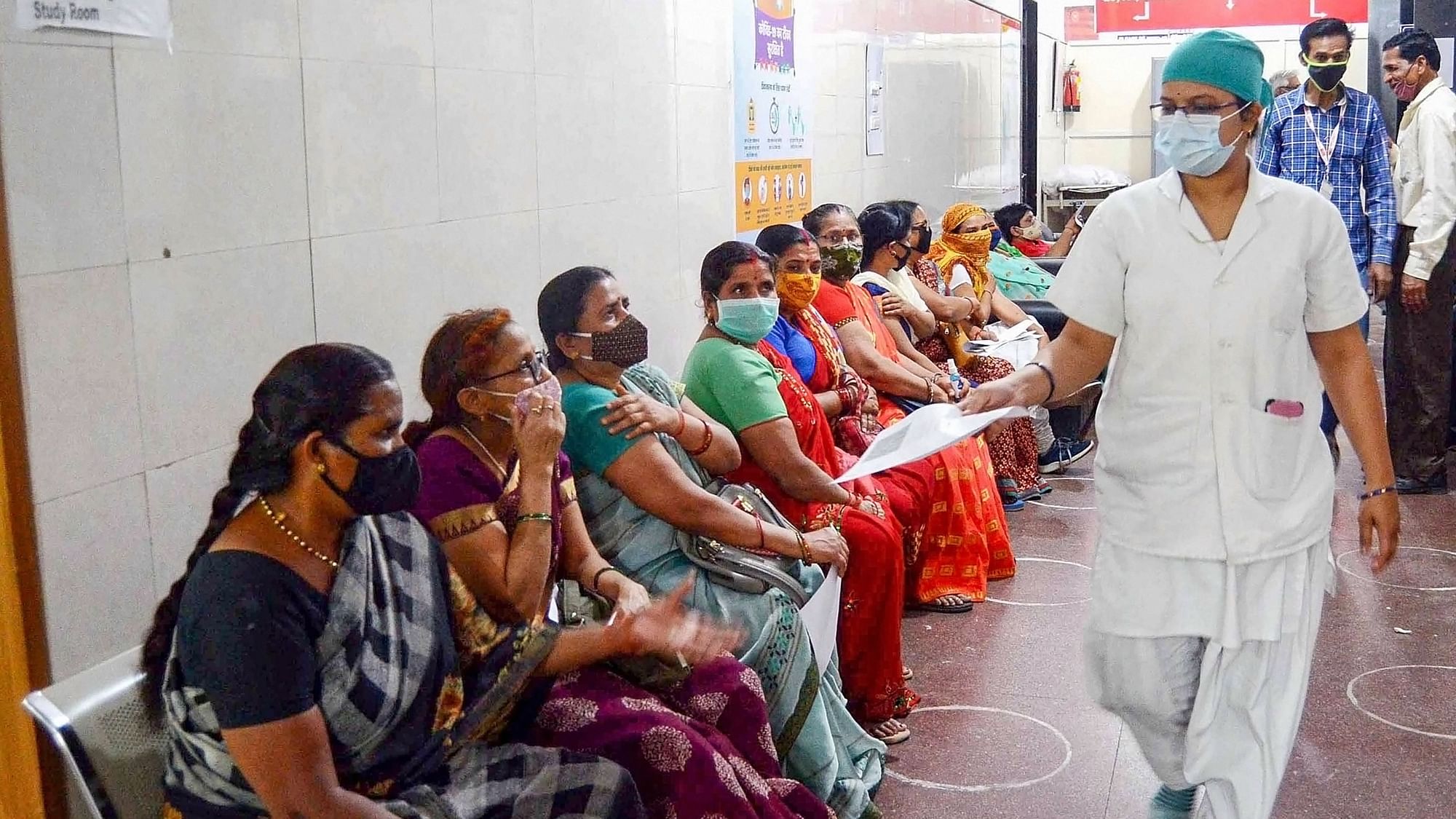 Recipients of the vaccine rest at an observation centre in Bhopal on 3 April. Image used for representational purposes.&nbsp;