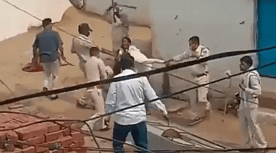 The incident captured on video has gone viral, where police personnel are seen hitting a man and two women with long plastic pipes. Some men were also seen attacking the police with sticks.