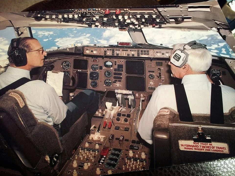 <div class="paragraphs"><p>Prince Philip flying a plane.</p></div>