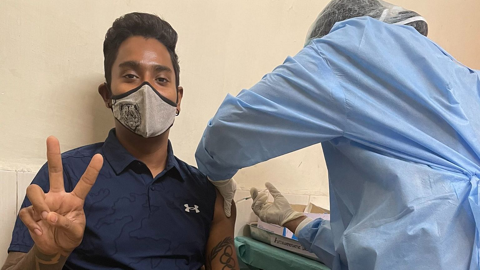 Indian Archer Atanu Das receives his COVID-19 vaccine.&nbsp;