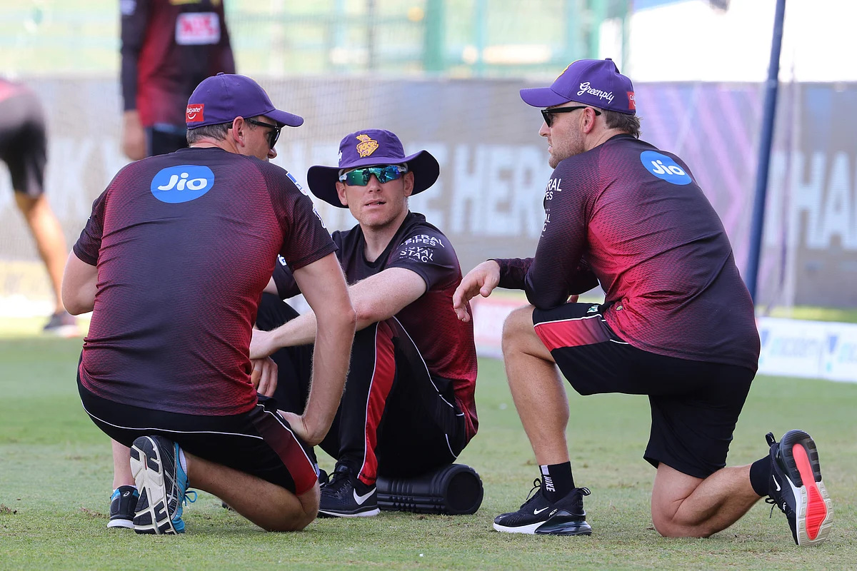 Eoin Morgan captain of Kolkata Knight Riders speaks with Brendon McCullum, head coach of Kolkata Knight Riders during IPL 2020.