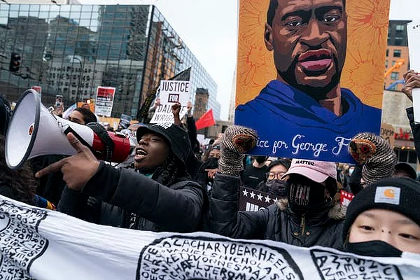 Demonstrators march in Minneapolis, Minn., during the murder trial of former police officer Derek Chauvin in the killing of George Floyd. 