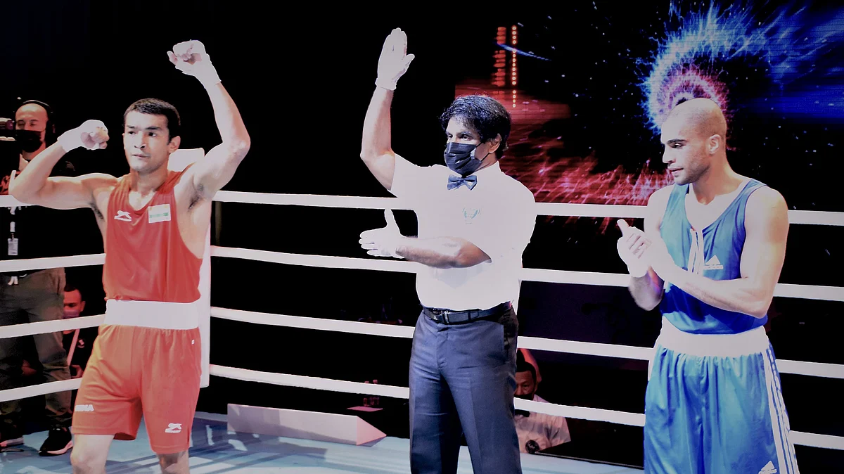 <div class="paragraphs"><p>Shiva Thapa celebrates his quarter-final win at the 2021 Asian Boxing Championships </p></div>