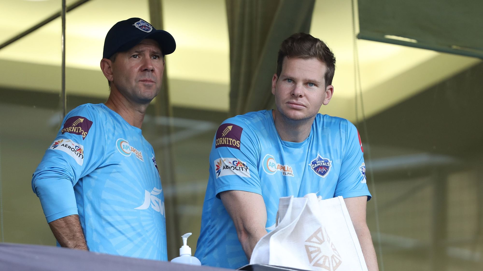 Delhi Capitals’ Steve Smith and Ricky Ponting in the dressing room balcony during IPL 2021.&nbsp;