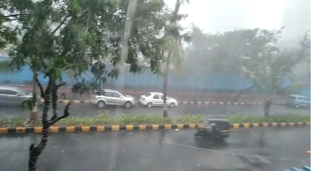 Heavy rain drenches Navi Mumbai’s Juinagar locality.