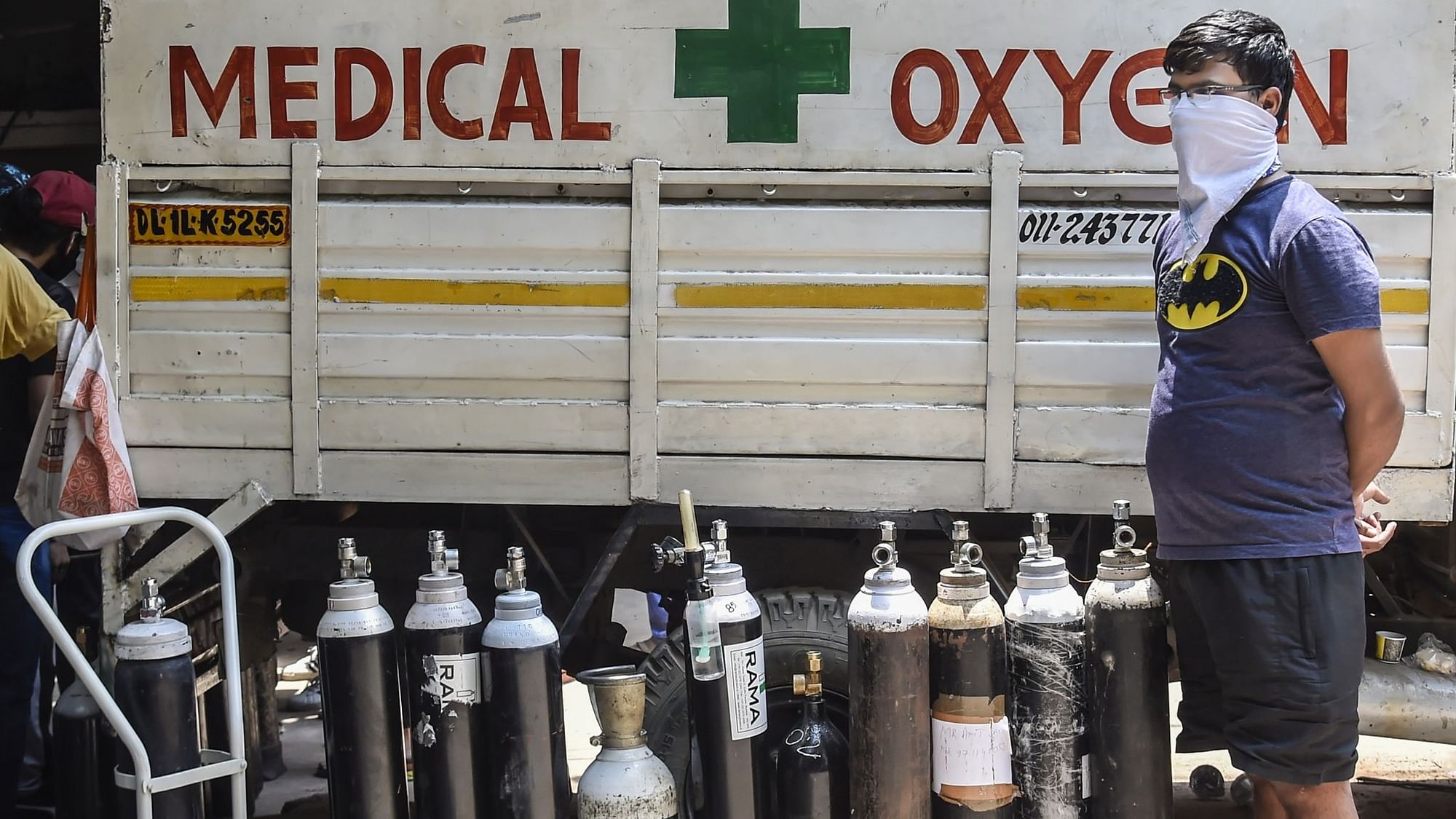 New Delhi: A family member of a COVID-19 patient outside an oxygen-filling centre to refill their empty cylinders. Image used for representation.