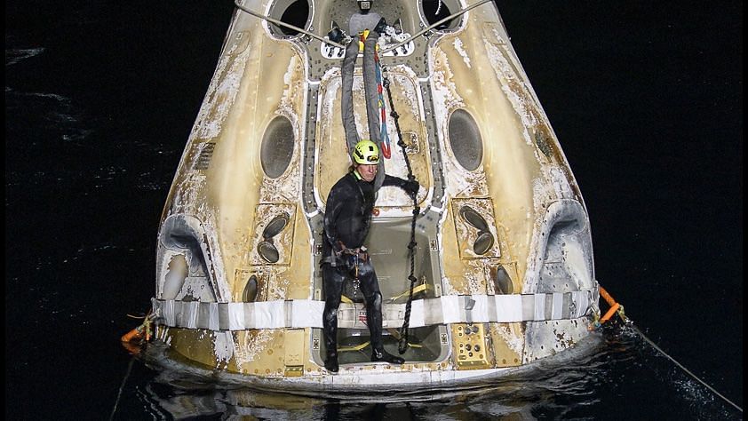 A SpaceX Crew Dragon capsule splashed down off Florida carrying four astronauts.