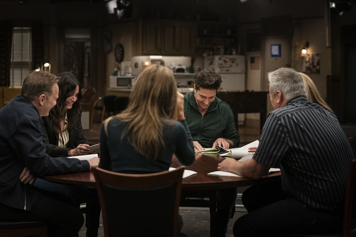 <div class="paragraphs"><p>The cast doing a table read of old scenes.</p></div>