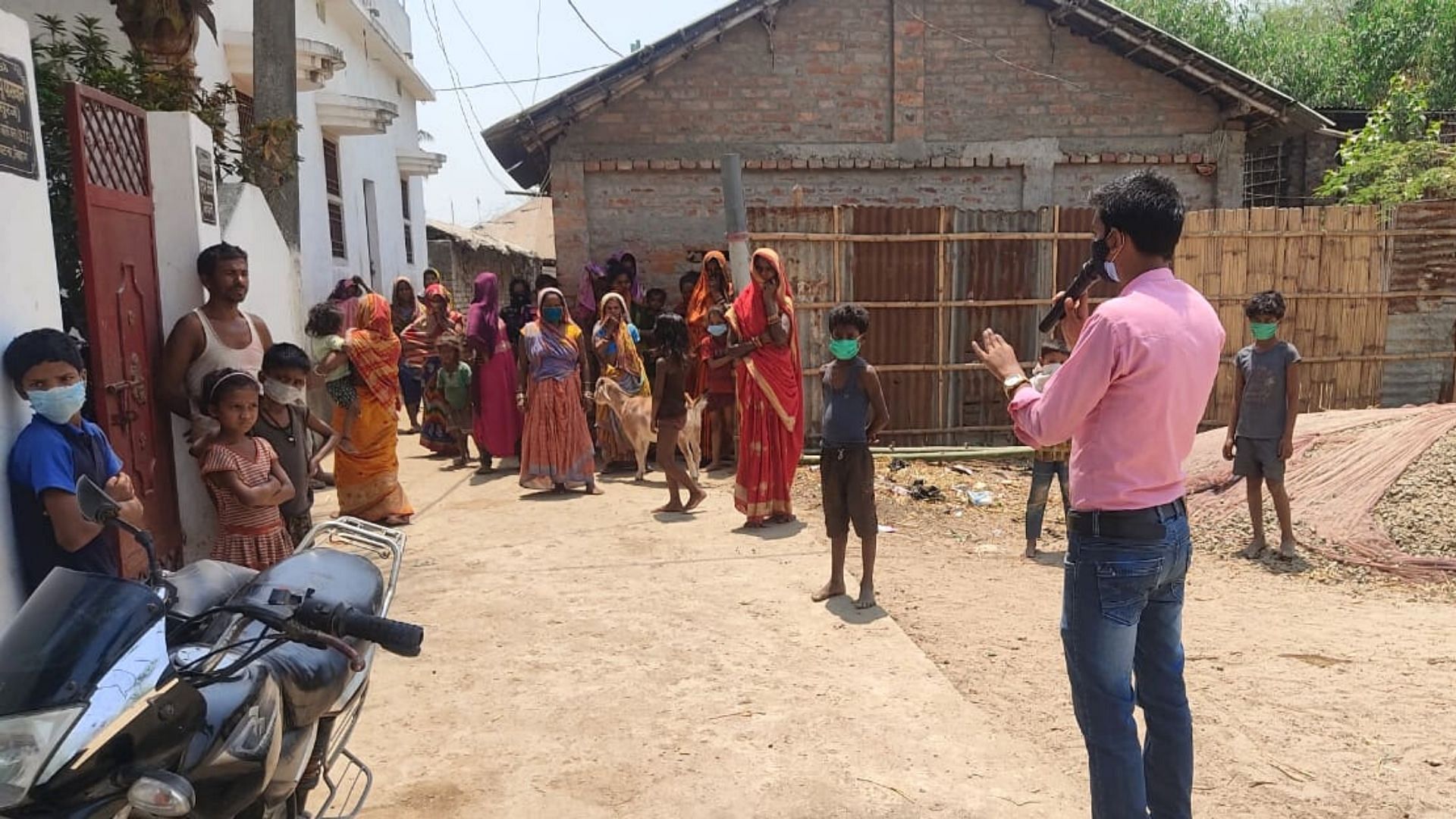 Volunteers are visiting villages in Bihar making announcements  about COVID-related SOPs.