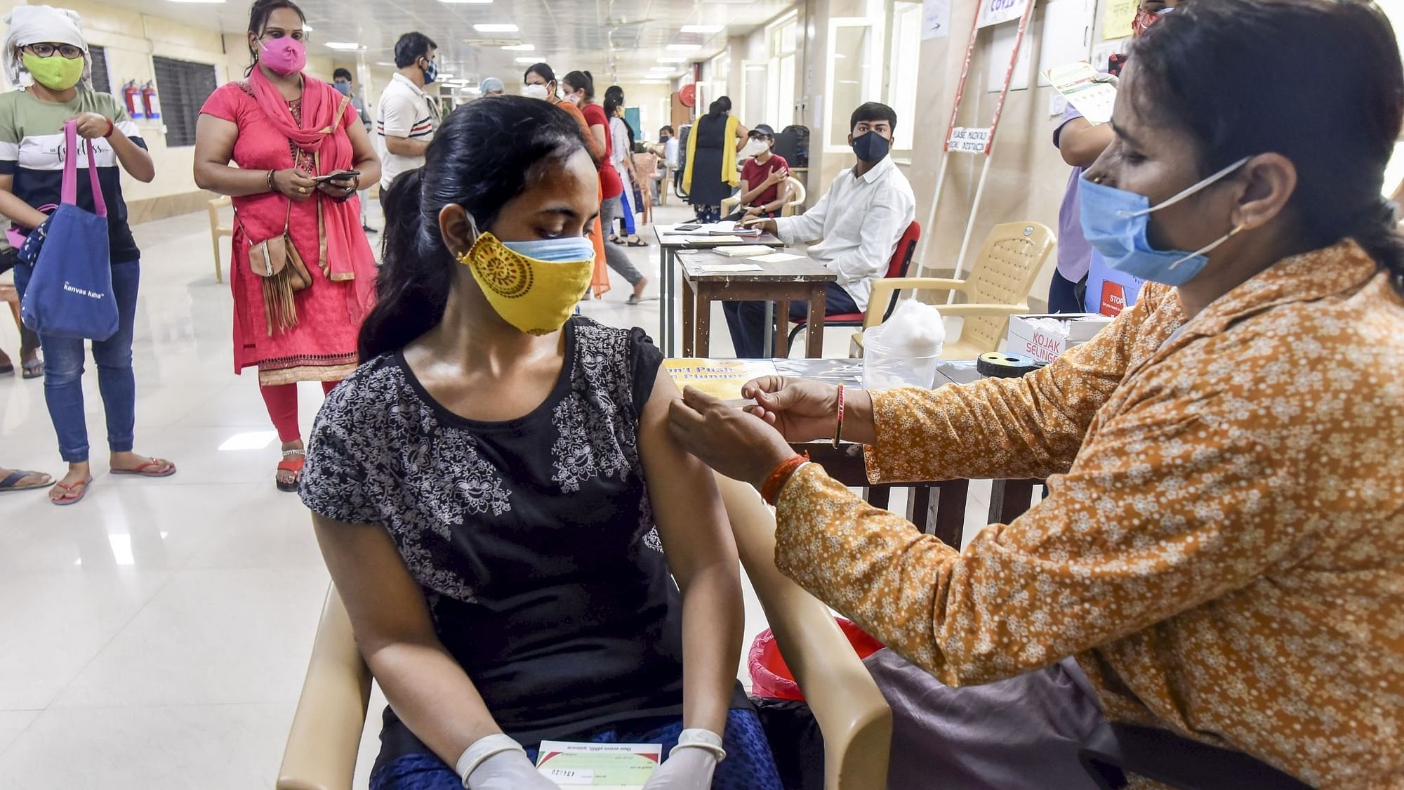 A beneficiary receives a dose of the COVID-19 vaccine at Moti Lal Nehru Medical College in Prayagraj, Monday on 24 May. Image used for representational purposes only.&nbsp;