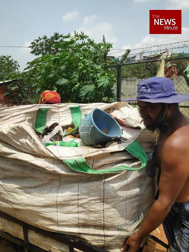 <div class="paragraphs"><p>Shariful hauling waste at the migrant settlement in Hebbal.</p></div>
