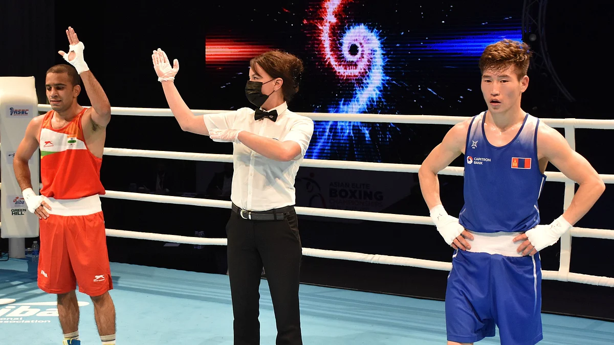 Amit Phangal celebrates his quarter-final victory at the Asian Boxing Championship