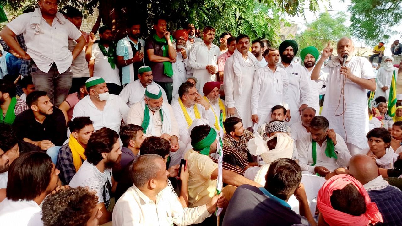 BKU spokesperson Rakesh Tikait and others stage a protest against Centre’s three farm laws, at Tohana in Haryana’s Fatehabad district on Sunday, June 6.