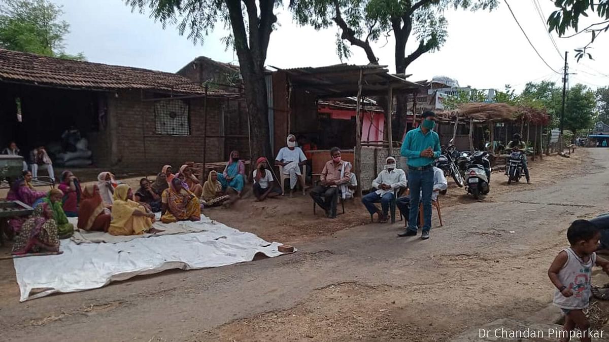 A public meeting underway in Chinchkheda village early in May. PHC doctors, block-level officials and local political leaders led the meeting, clearing citizens’ doubts regarding the vaccine.