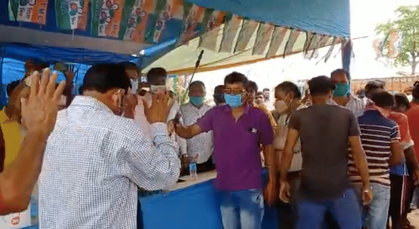In the video, the BJP local workers stood in a line and were then sprayed with sanitiser by TMC local leaders. They were then handed TMC flags after they were “purified”.