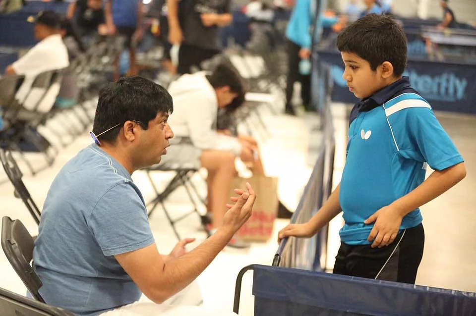<div class="paragraphs"><p>Rajul Sheth with his son Ved Sheth while coaching.</p></div>