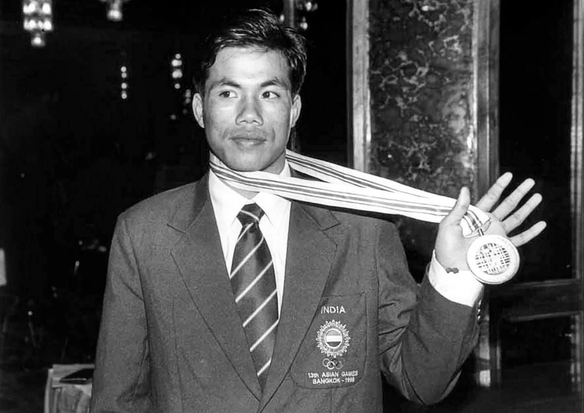 Dingko soaking in the applause after securing Gold at the 1998 Asian Games. 