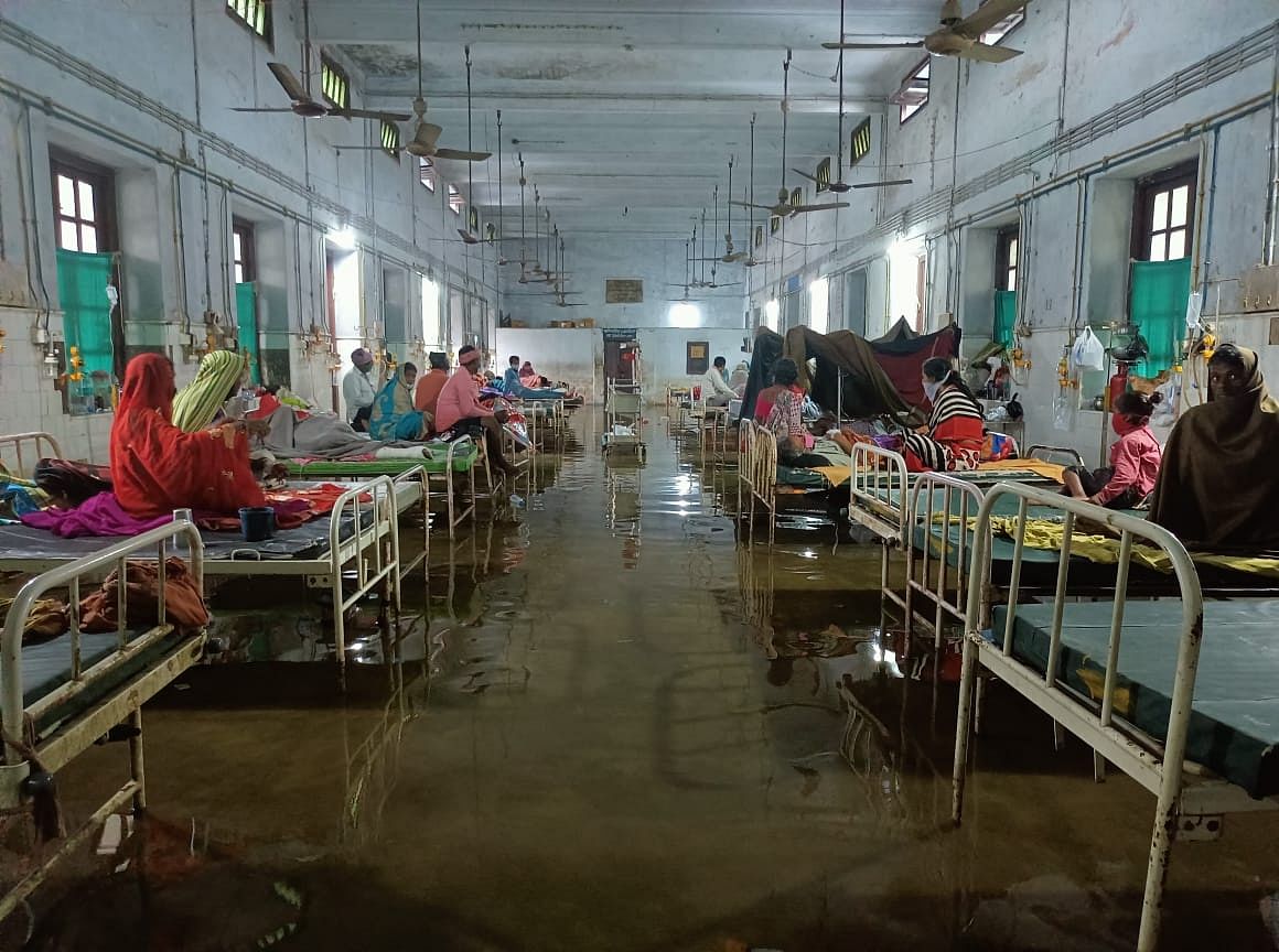 The rains triggered by the onset of Cyclone Yaas had flooded the hospital premises. Patients were being treated in wards that were logged with sewage water.
