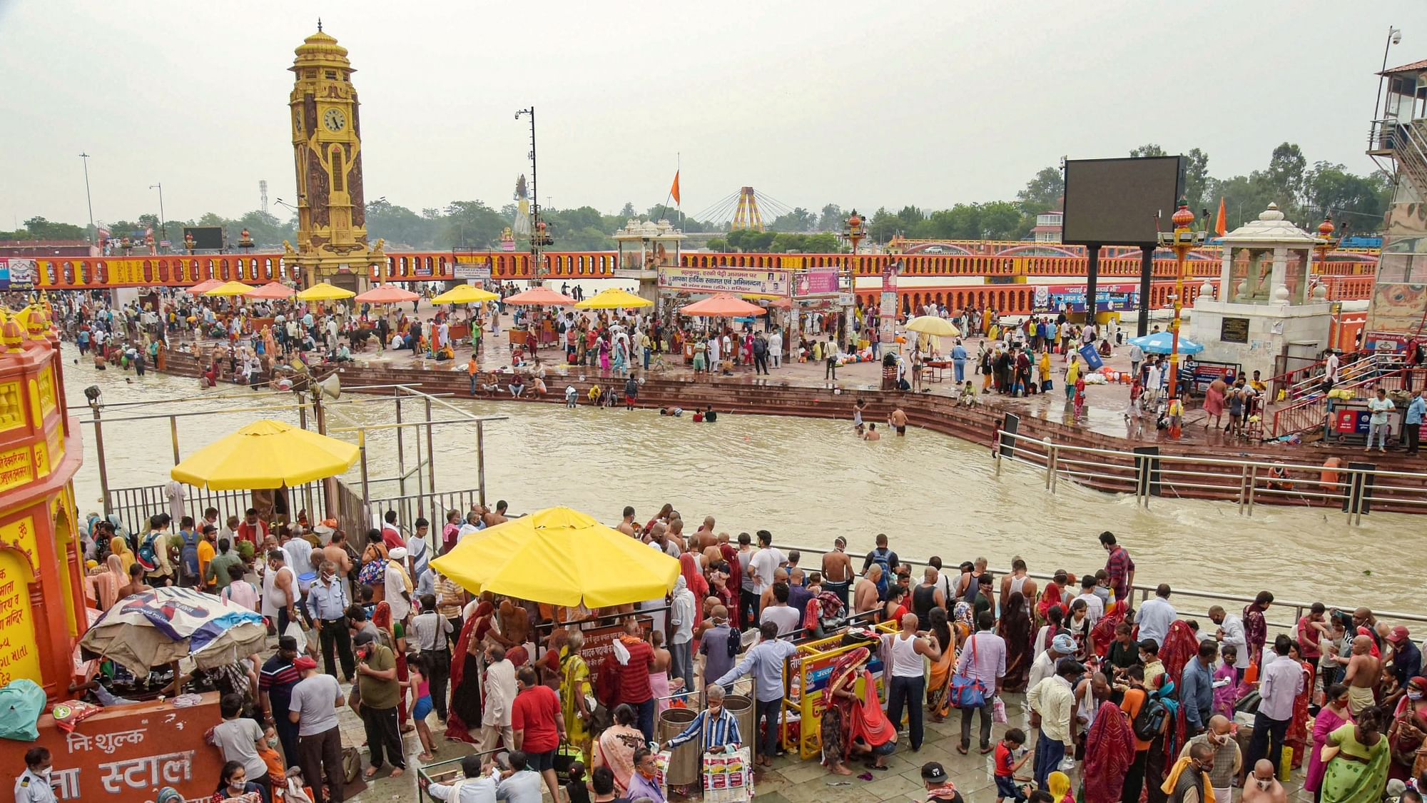 Flouting COVID protocols, devotees gather at the banks of the Ganga river on the occasion of ‘Vat Purnima’, at Har Ki Pauri ghat in Haridwar on Thursday, 10 June. Image used for representation only.