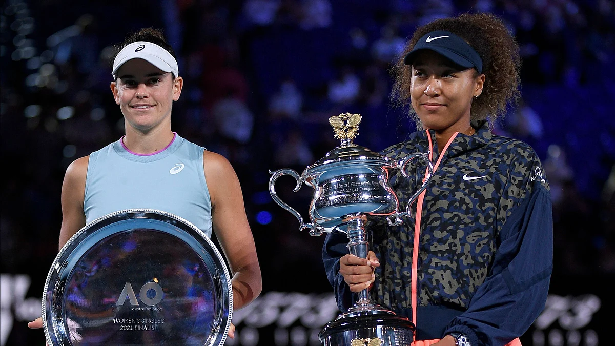 <div class="paragraphs"><p>Naomi Osaka holds the Daphne Akhurst Memorial Cup aloft after defeating Jennifer Brady in the women's singles final at the 2021 Australian Open.</p></div>