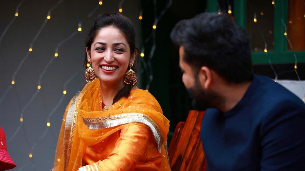 <div class="paragraphs"><p>Yami Gautam smiles wide as she looks at husband Aditya Dhar</p></div>