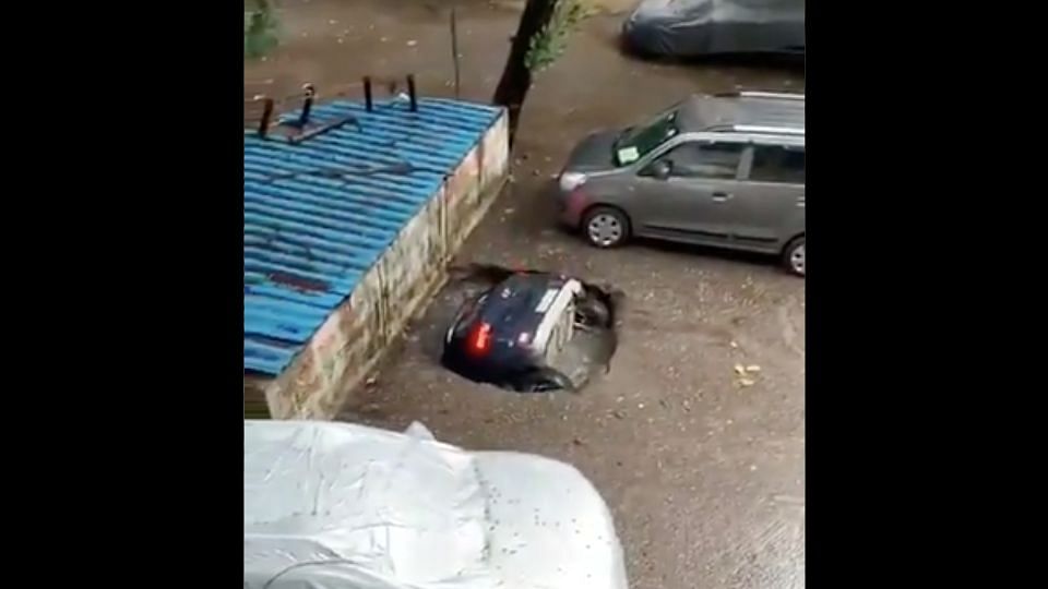 A car in Mumbai’s Ghatkopar area on Sunday, 13 June, drowned in a reinforced cement concrete (RCC)-covered well after the slab on which the car was parked caved in due to the incessant rainfall in the city.