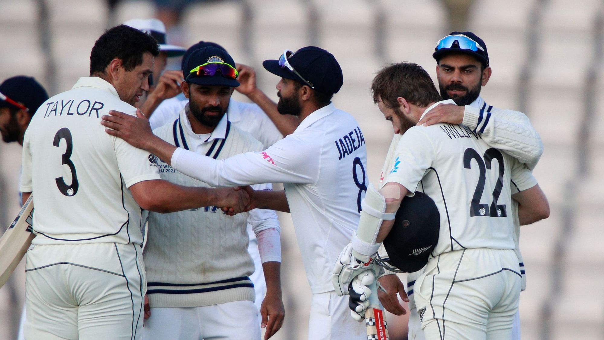 India’s captain Virat Kohli, second right, congratulates New Zealand’s Ross Taylor and captain Kane Williamson, right, on their win on the sixth day of the World Test Championship final.