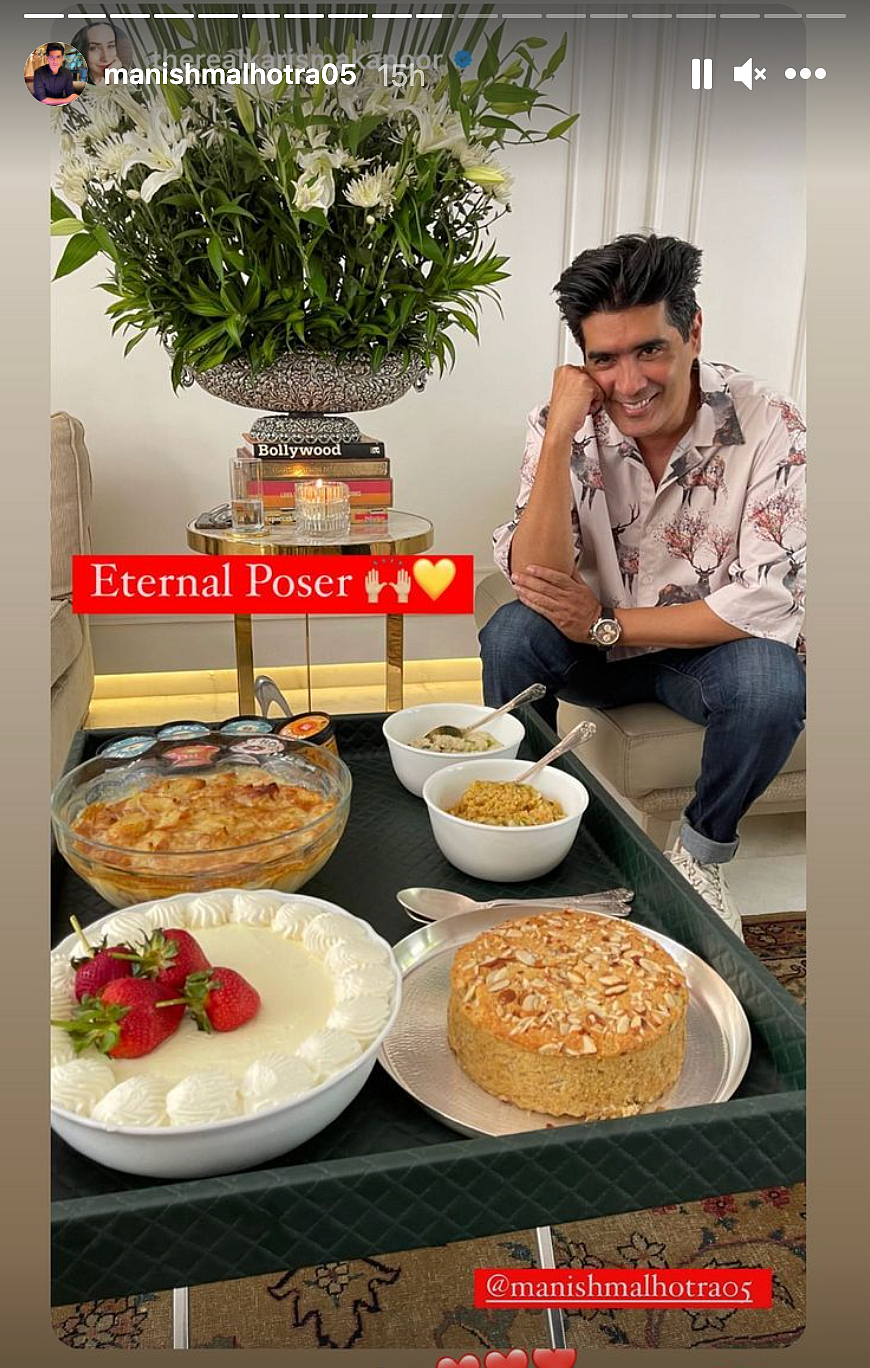 <div class="paragraphs"><p>Manish poses in front of desserts. </p></div>
