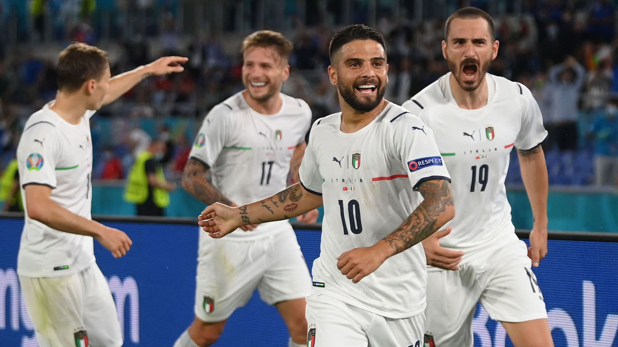  Lorenzo Insigne and Italy celebrate their goal against Turkey.