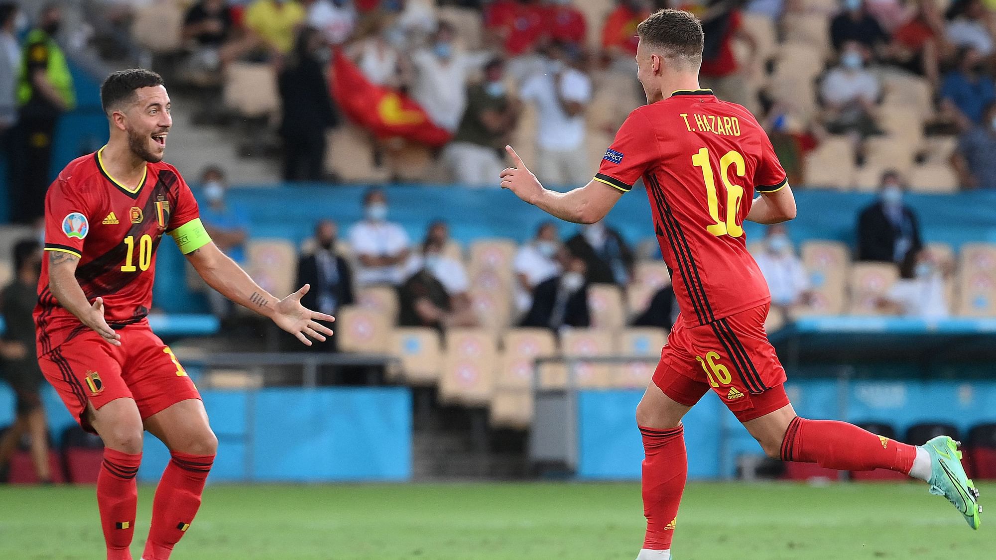 Thorgan Hazard celebrates his goal with brother Eden against Portugal in Euro 2020.