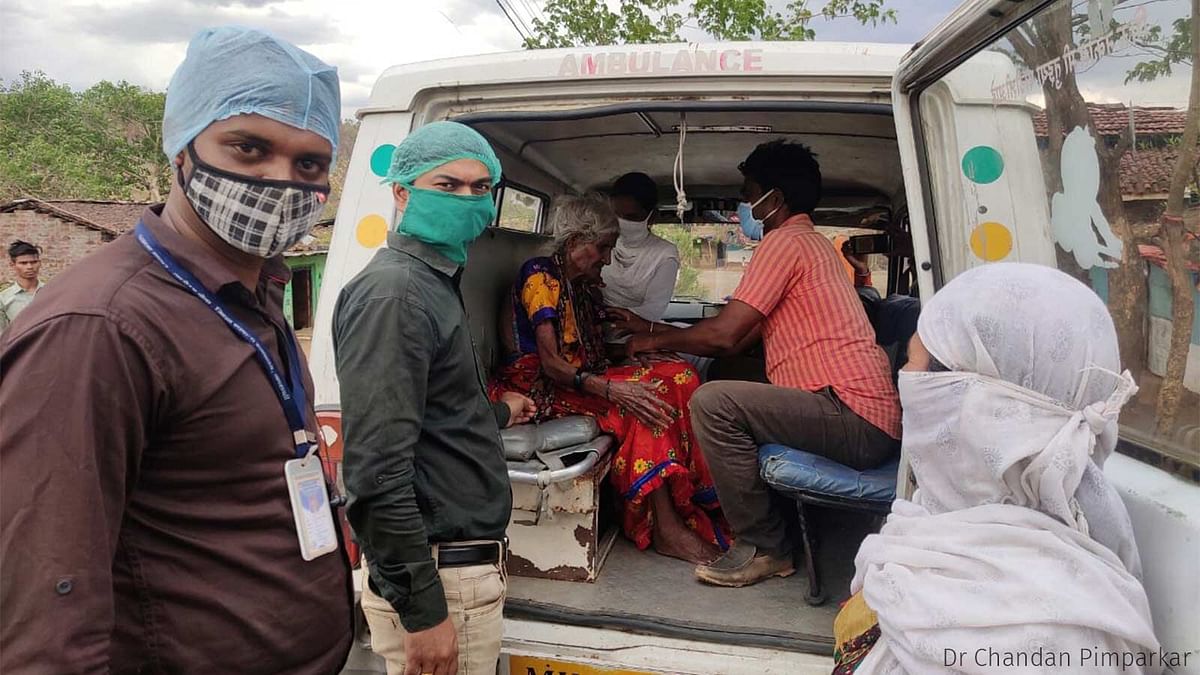 A mobile unit vaccinates a senior citizen in a Melghat village.