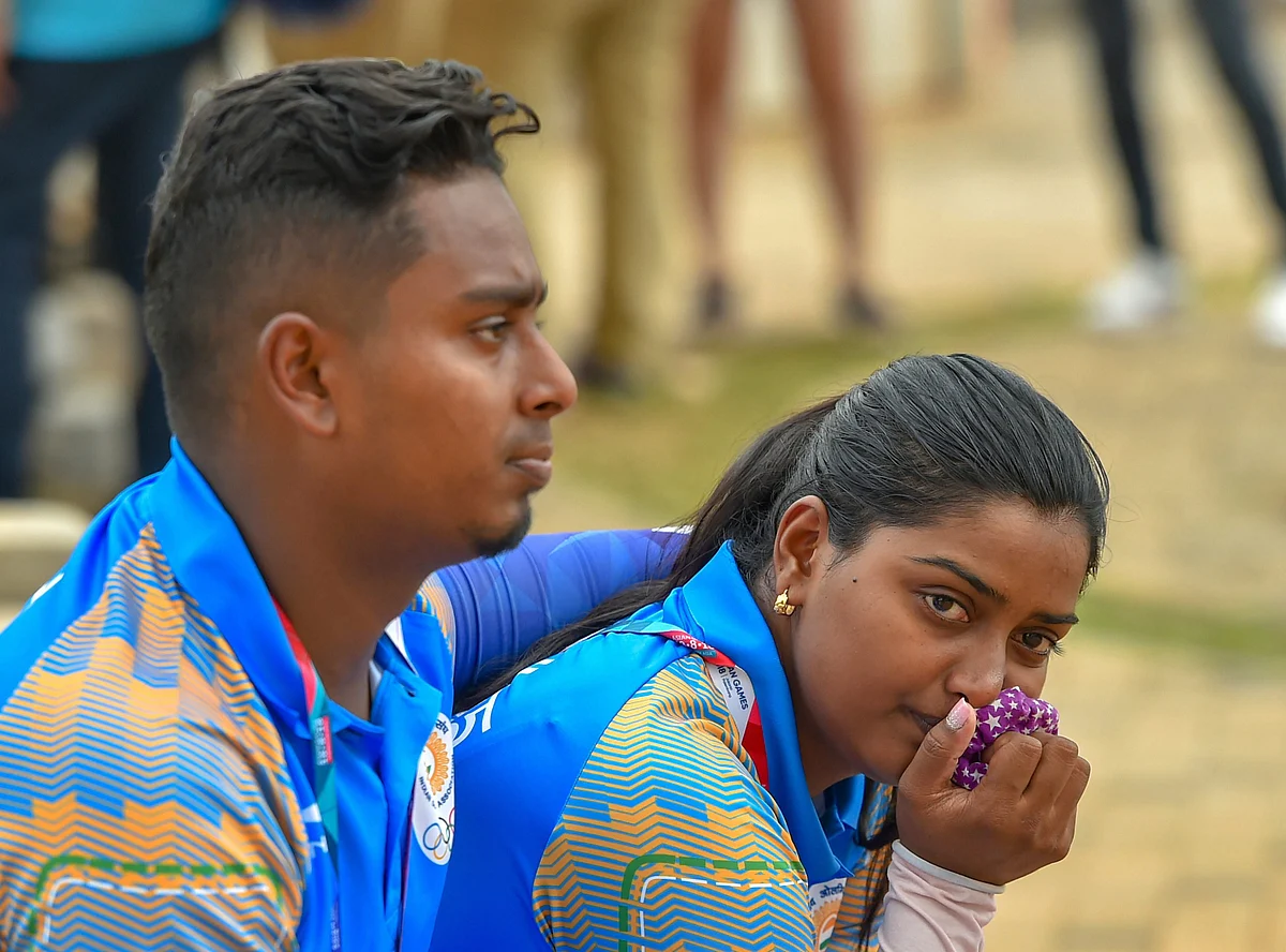 Indian archers Deepika Kumari and Atanu Das look dejected after recurve in mix team elimination event at the Asian Games 2018, in Jakarta on 24 August 2018.