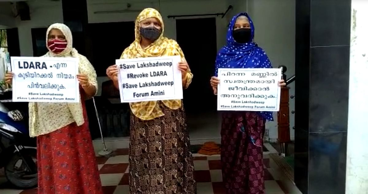 Residents of Lakshadweep protested holding placards outside their homes, lying on charpoys and even underwater.