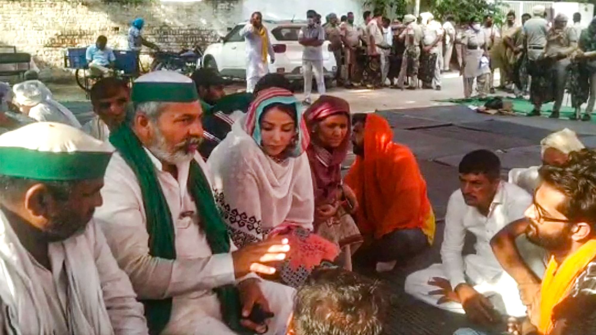 <div class="paragraphs"><p>BKU leader Rakesh Tikait with supporters during a dharna outside a police station seeking the release of arrested farmers in Tohana.</p></div>