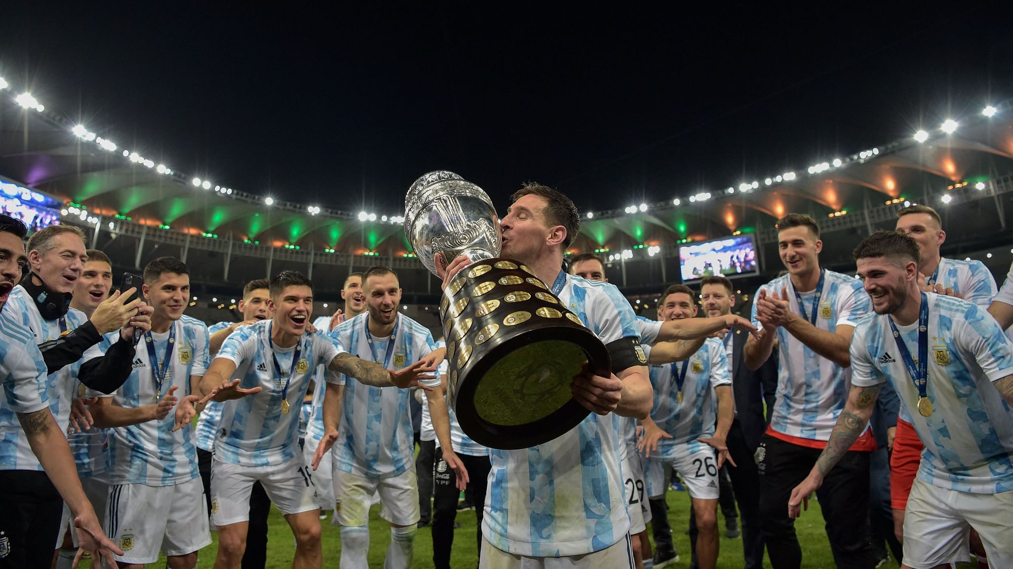 <div class="paragraphs"><p>Lionel Messi with the Copa America trophy after the final win against Brazil</p></div>