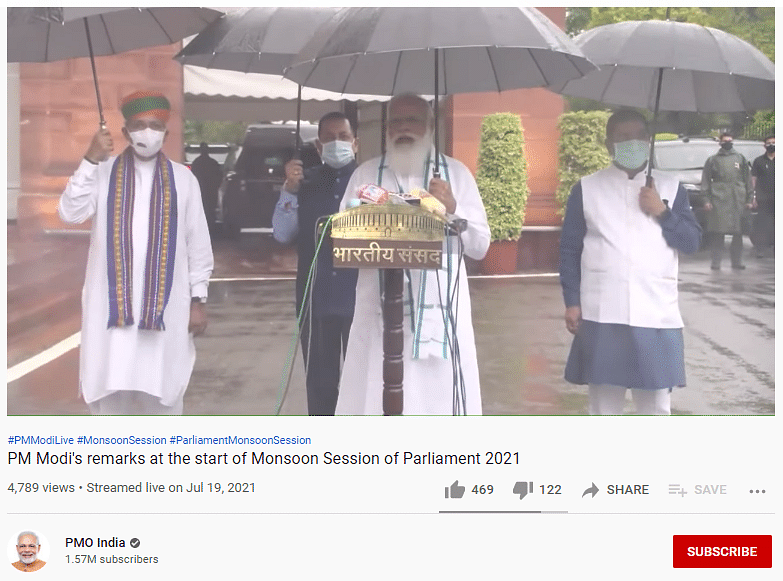Photo Of PM Modi Holding A Jio Umbrella Is Satire