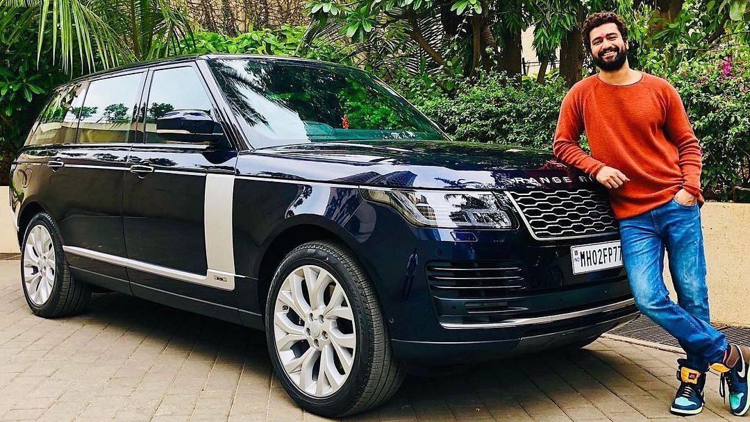 <div class="paragraphs"><p>Vicky Kaushal poses with his new Range Rover.</p></div>