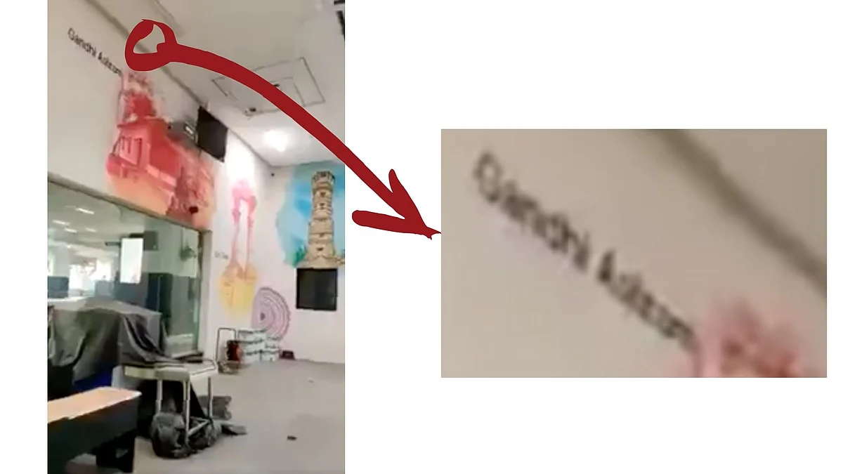 <div class="paragraphs"><p>The word 'Gandhi Ashram' can be seen painted on the wall.</p></div>