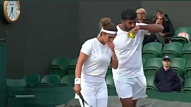<div class="paragraphs"><p>Sania Mirza and Rohan Bopanna in conversation during their match at Wimbledon.</p></div>