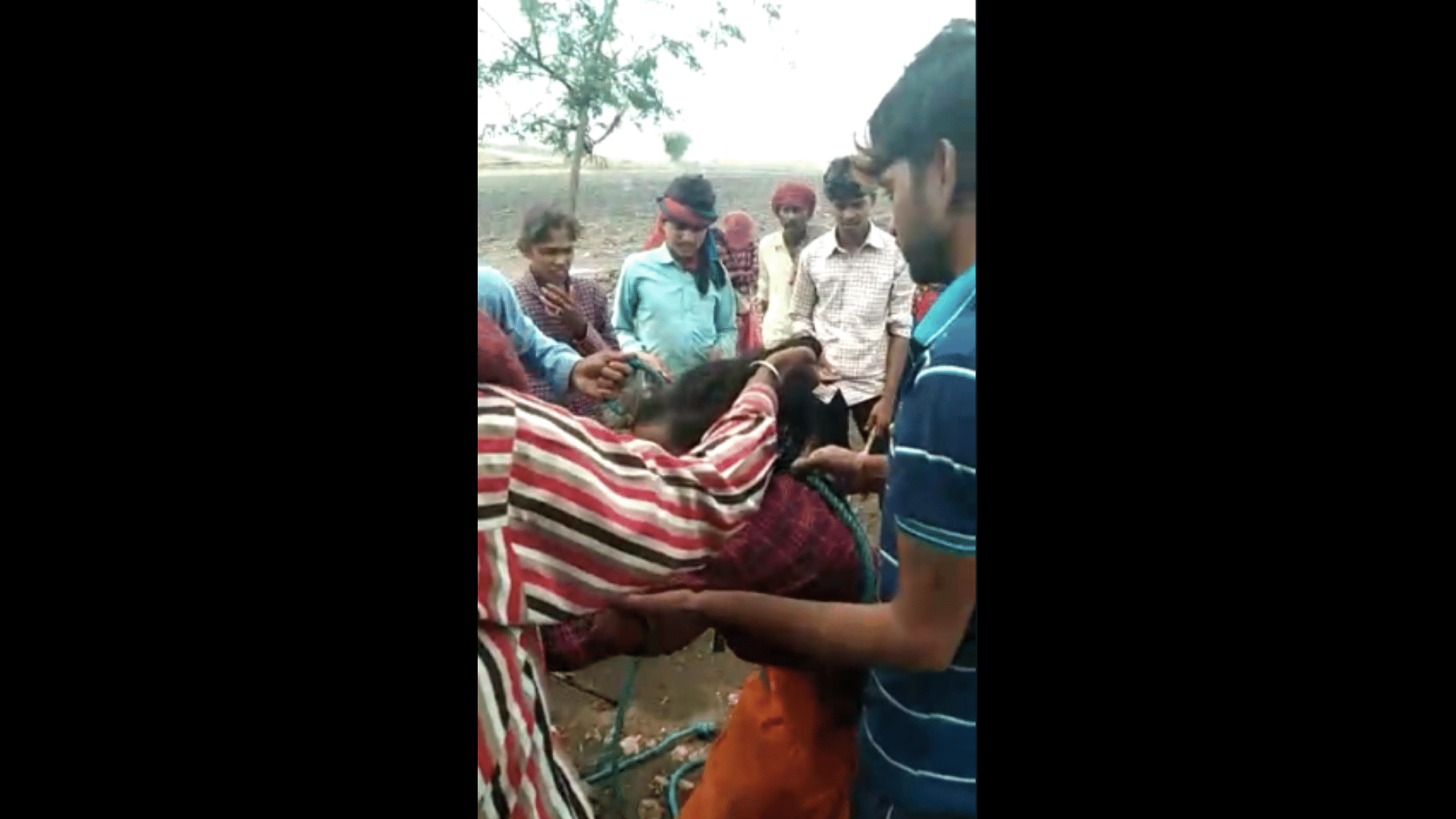 <div class="paragraphs"><p>In a barbaric incident, a 19-year-old tribal woman was dragged by her hair, hung to a tree and brutally beaten in Madhya Pradesh’s Alirajpur district for allegedly running from her in-laws house.</p></div>