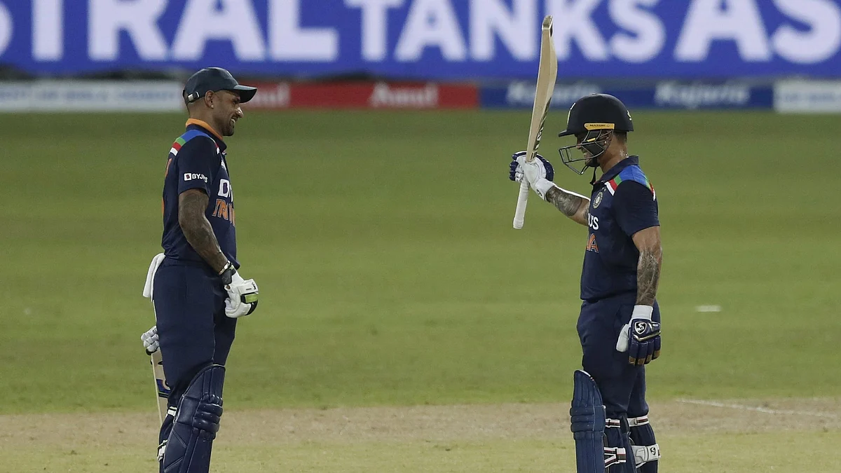 <div class="paragraphs"><p>Captain Shikhar Dhawan smiles on as Ishan Kishan celebrates his half century, on ODI debut.</p></div>