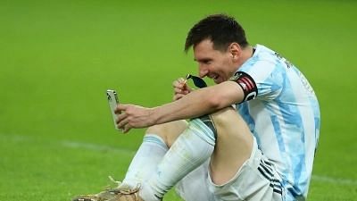 <div class="paragraphs"><p>Lionel Messi speaking to his family after Argentina won the 2021 Copa America.&nbsp;</p></div>