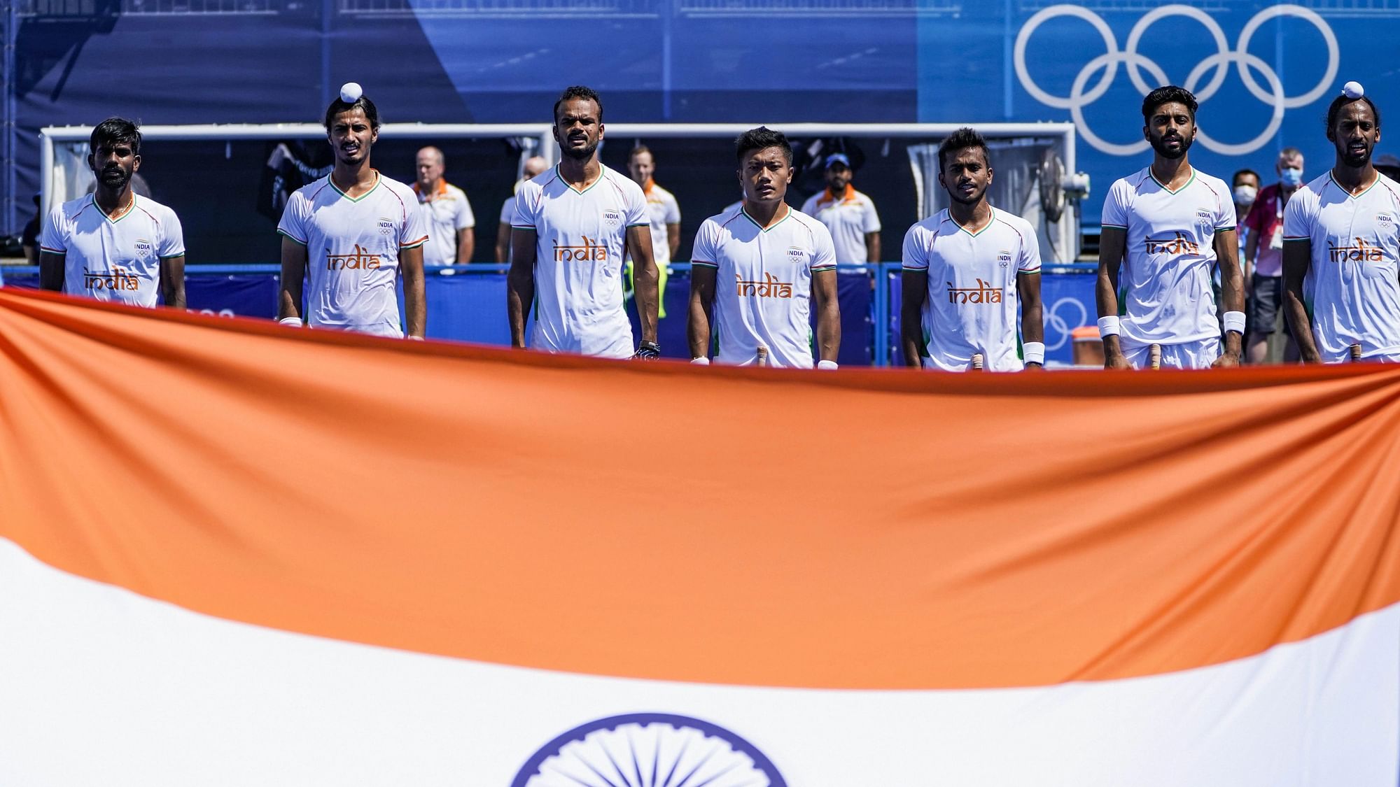 <div class="paragraphs"><p>Indian men's hockey team during the national anthem.</p></div>