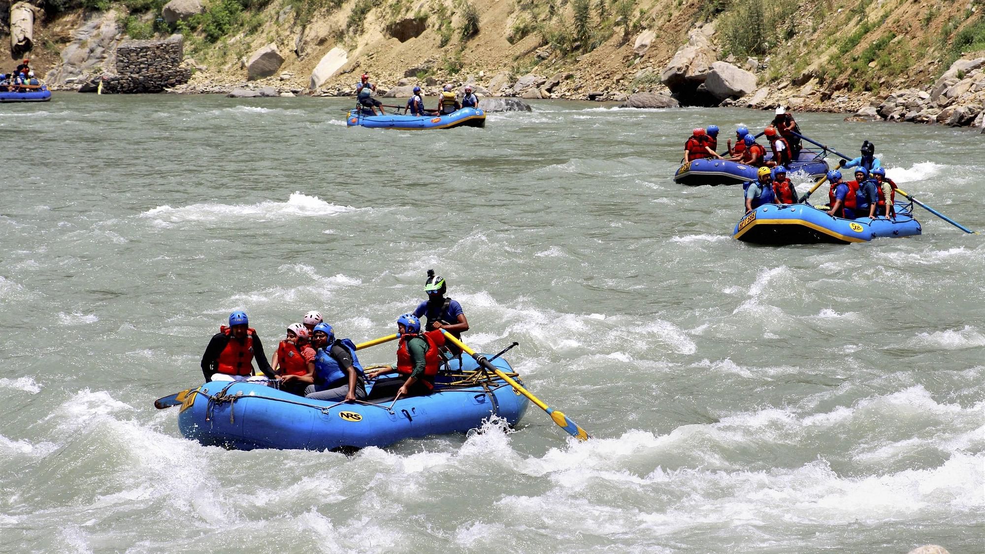 <div class="paragraphs"><p>Manali: Tourists taking part in water sport activities in Beas river in Manali on 2 July.</p></div>