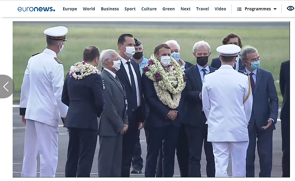 French President Covered in Flower Garlands? Picture is Edited