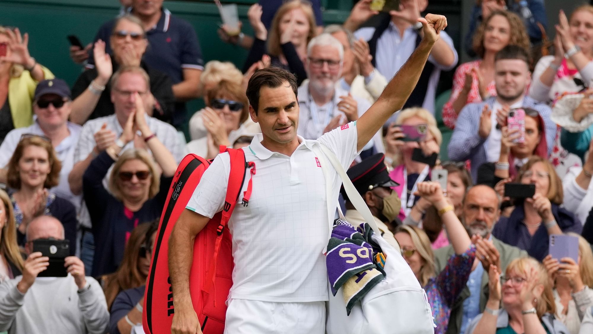 <div class="paragraphs"><p>London: Switzerland's Roger Federer leaves the court after being defeated by Poland's Hubert Hurkacz during the men's singles quarterfinals match on day nine of the Wimbledon Tennis Championships in London.</p></div>