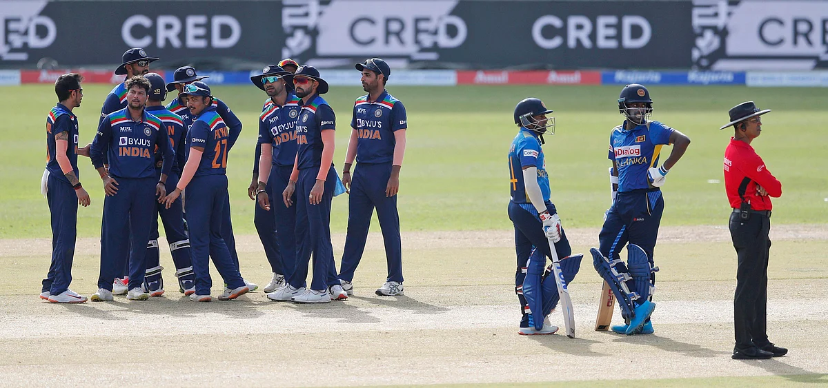<div class="paragraphs"><p>India's bowler Kuldeep Yadav, second left, with his teammates waiting for a third umpire decision against Sri Lanka's Bhanuka Rajapaksa, third right, during the first one day international cricket match between Sri Lanka and India in Colombo, Sri Lanka, Sunday, July 18, 2021.</p></div>