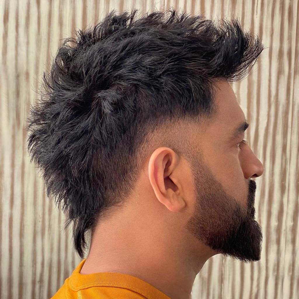 Cricket Legend Mahendra Singh Dhoni sports new hairstyle and beard 