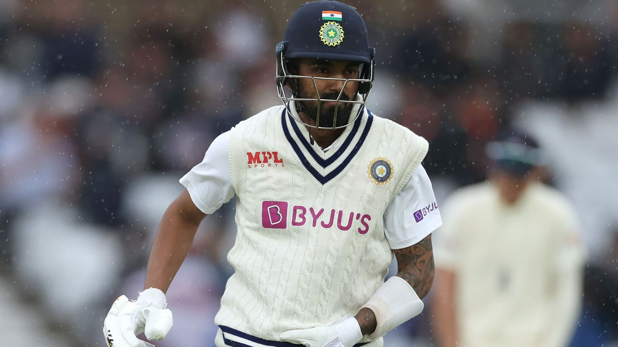 <div class="paragraphs"><p>KL Rahul runs off the ground as rain stopped play in Nottingham.</p></div>